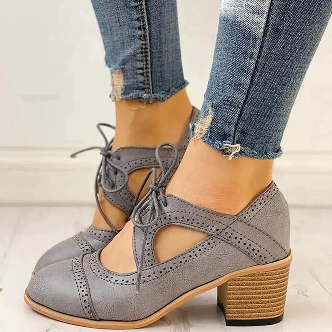 Buty na słupku z wiązaniem i paskiem T-strap